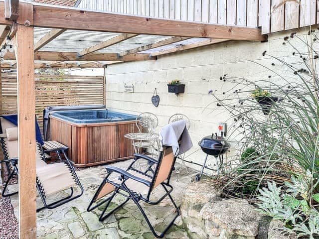 Hot tub | Hayloft - Clapham Holme Farm Cottages, Great Hatfield, near Hornsea