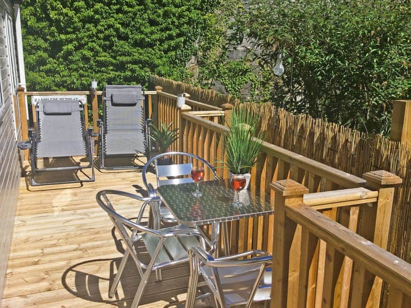 Sitting-out-area | Rambler&rsquo;s Retreat - Brigham Holiday Park, Brigham, near Cockermouth