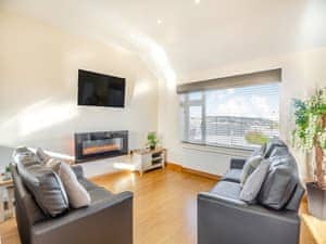 Living area | Math Cottage - Bryn Awel Caravan Park, Pentraeth