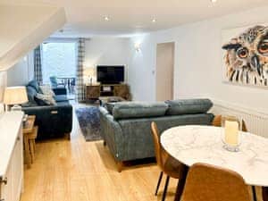 Motorised foot rest sofas with charging points built in | April Cottage, 