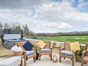Relaxing terrace with hot tub | Llwyn Du, Abersoch, near Pwllheli