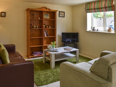 Living room with sofa bed | Lily Pad 5 - Lily Pad Cottages, Nassington, near Stamford