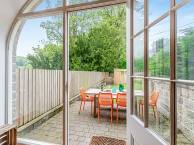 Looking out over courtyard | The Mill Townhouse, Glasshouses, near Pateley Bridge