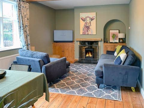 Living room with woodburner | Corner Cottage, Homersfield, near Southwold