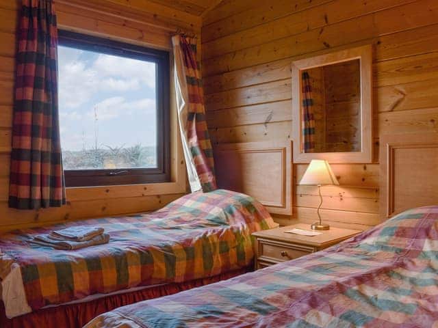 Twin bedroom | Jasmine Lodge, Woolsery, near Hartland