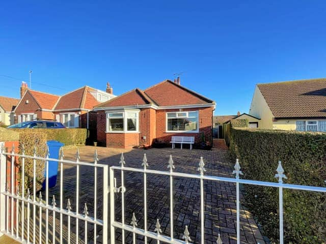 Front of property with spacious drive and gates | Roslyn, Hornsea