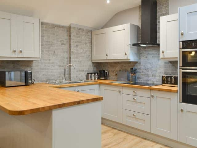 Kitchen area | Bumble Cottage, Cockermouth