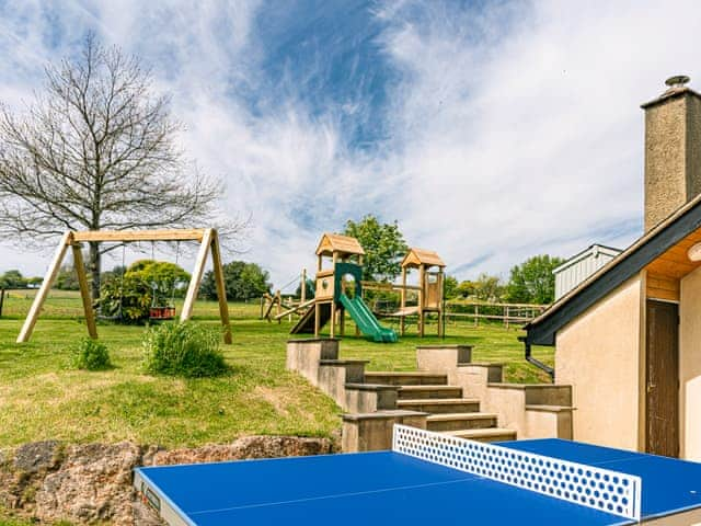 Outdoor recreation area with children&rsquo;s play equipment | Lower Elsford Farm, Lustleigh, near Bovey Tracey