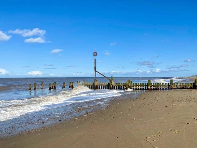 This beach is just a 2 minute walk away | Dimmock Cottage, Bacton