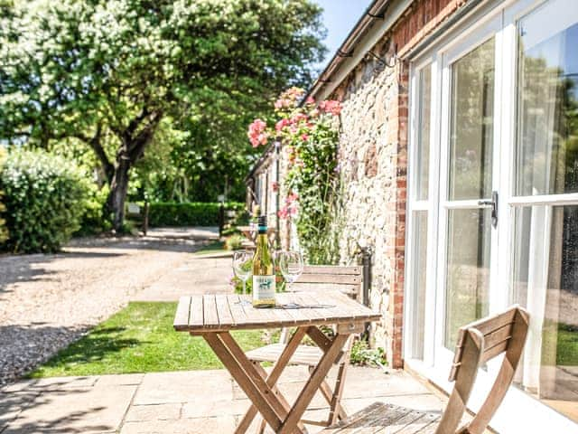 Sitting-out-area | Palomino Cottage - Brook Farmhouse Cottages, Brook, near Brighstone