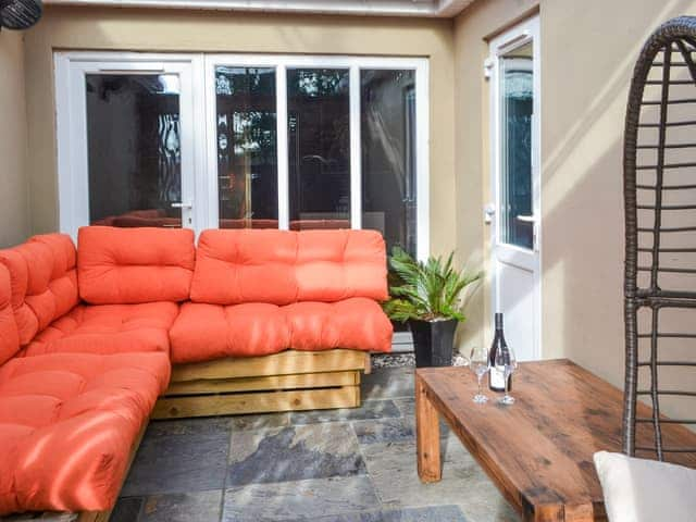 Sitting-out-area | Valhallah Cottage Retreat, South Broomhill, near Amble