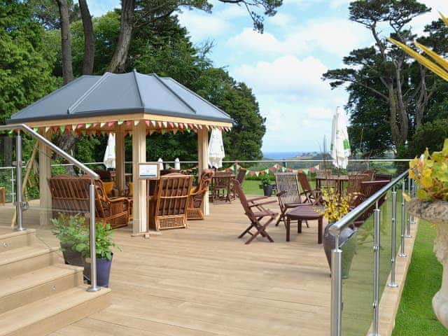 Sitting-out-area | Coach House - Penmorvah Manor Courtyard Cottages, Budock Water, near Falmouth