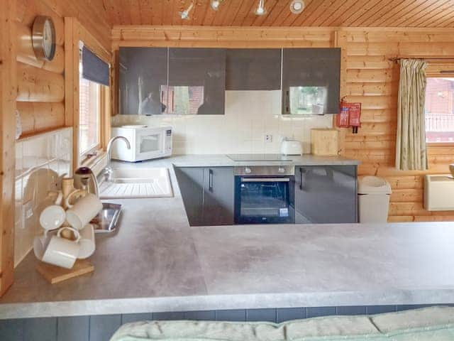 Kitchen area | Paradise Lodge - Kenwick Lodges, Louth