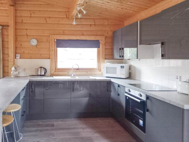 Kitchen area | Paradise Lodge - Kenwick Lodges, Louth