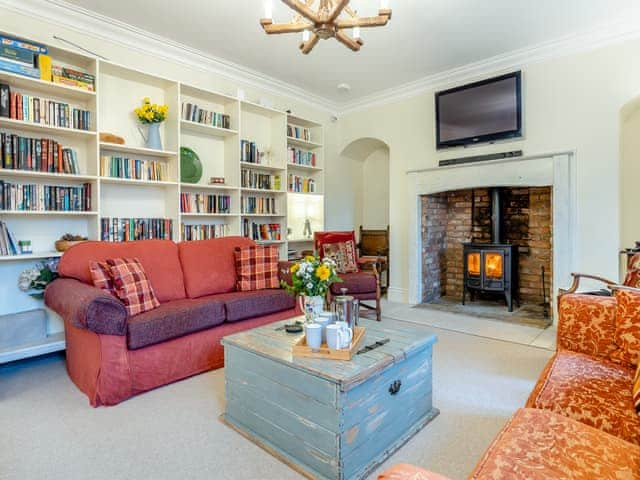 Living room with wood burner | Islington Hall, Tilney All Saints, near King&rsquo;s Lynn