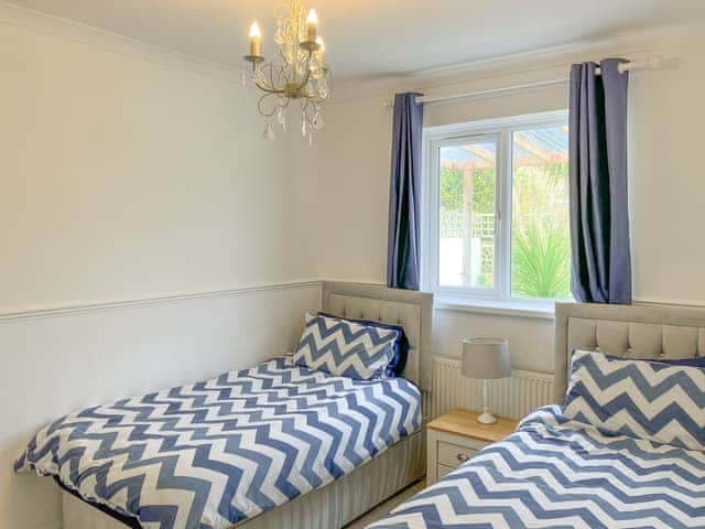 Ground floor twin beds looking out to garden | Poppy&rsquo;s by the sea, Hayling Island