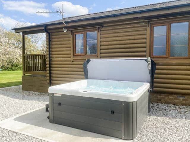 Hot tub | Tarka&rsquo;s Holt Log Cabin - Stowford Lodge Holiday Cottages, Langtree, near Great Torrington