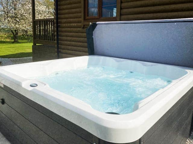 Hot tub | Tarka&rsquo;s Holt Log Cabin - Stowford Lodge Holiday Cottages, Langtree, near Great Torrington