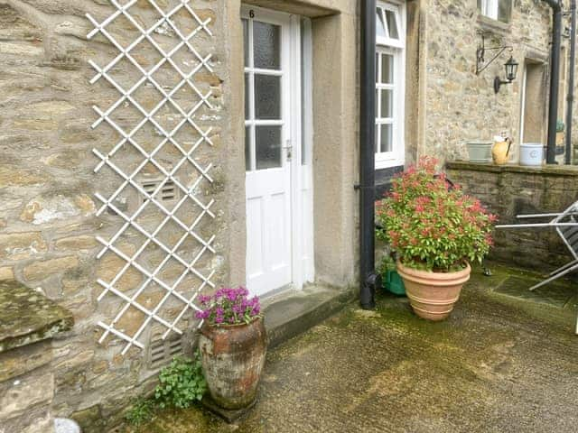 Entrance to cottage with an enclosed courtyard | Craven Cottage, Skipton