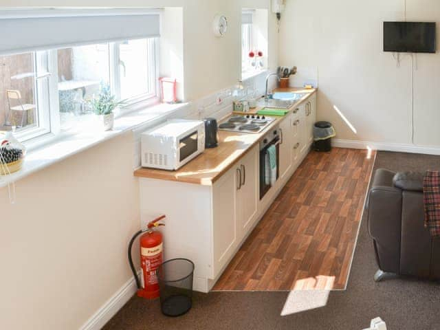 Kitchen area | Swan&rsquo;s Nest - Black Swan Cottages, Belford