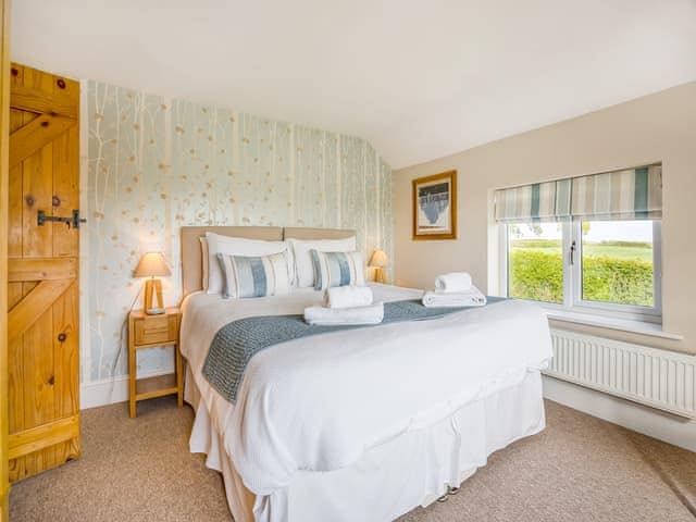 Super King bedroom | The Cottage, Ashby Puerorum, near Horncastle