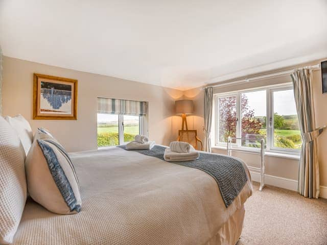 Super King bedroom | The Cottage, Ashby Puerorum, near Horncastle