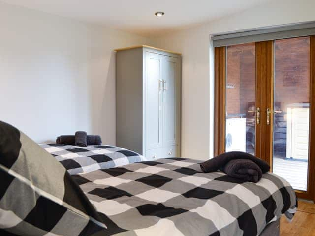 Twin bedroom | Kimberdale Lodge, Baldwinholme, near Carlisle