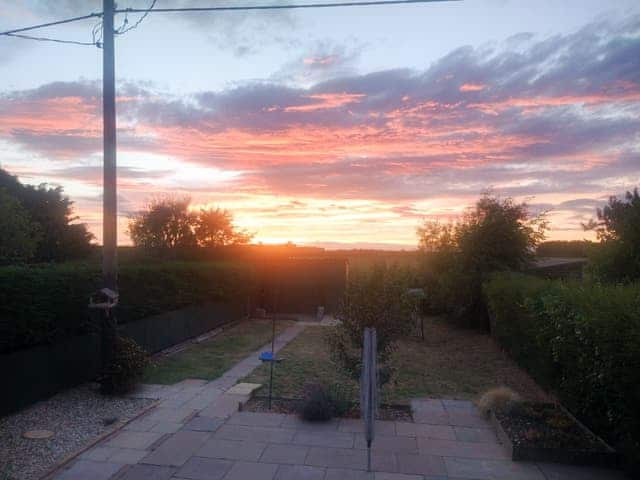 Sunset from the garden | The Oyster Catcher, Docking, near Brancaster