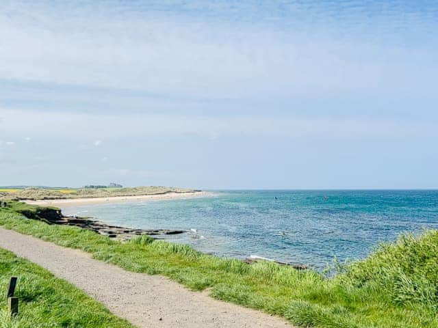 The view towards Bamburgh Castle from Seahouses | Quill Corner, Alnwick