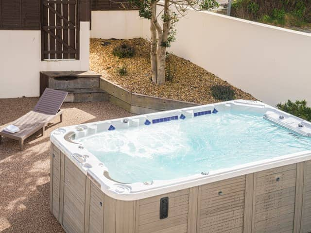 Hot tub | Riversmouth - Gwbert Holiday Cottages, Gwbert, near Cardigan