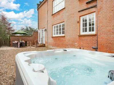 Enclosed patio area with hot tub | Ground Wing - Gresham Hall Estate, Gresham, near Sheringham