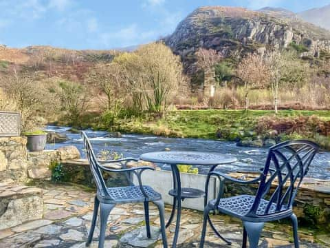 Sitting-out-area | Riverside Cottage, Beddgelert