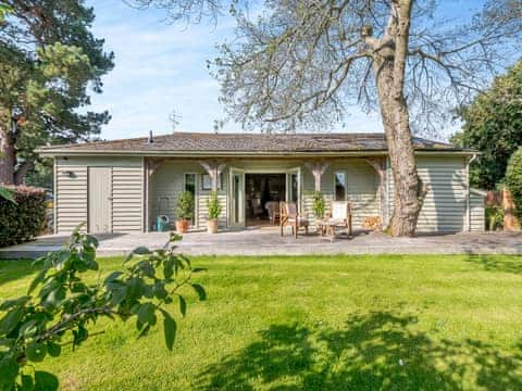 Stunning, self-contained, detached lodge | Lymington Lodge, Lymington