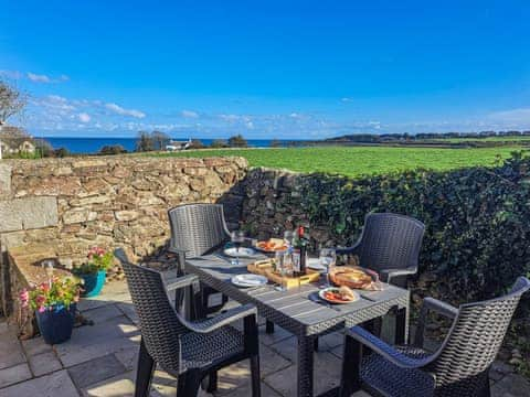 Sitting-out-area | Mulberry Cottage - Yellow Rock Holidays, Portyerrock, near Newton Stewart