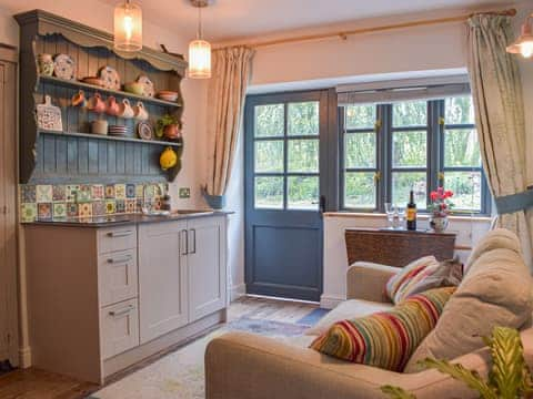 Open plan living space | Cwtch Wrth Plas - Plas Cottages, Talgarreg