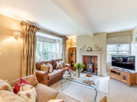Comfortable and warm living room with wood burner | Adair Cottage - Meresyke Farm, Wigglesworth, near Settle
