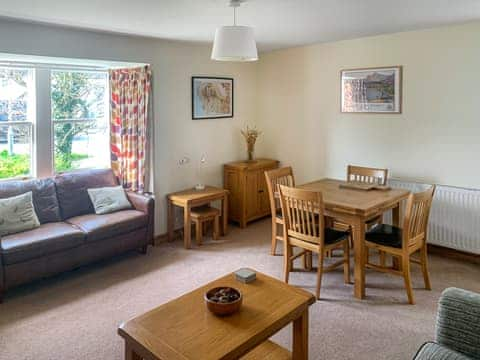 Well decorated living/dining room | 1 Lonsdale House - Greta Grove Apartments, Keswick