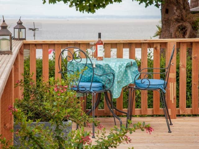 Sitting-out-area | Decking and sea view | Number 110, West Quantoxhead, near Watchet