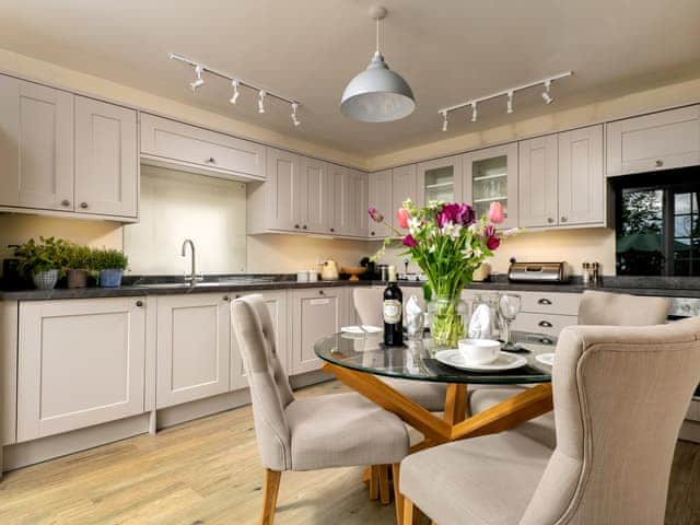 Elegant dining area within kitchen | Ground Wing - Gresham Hall Estate, Gresham, near Sheringham