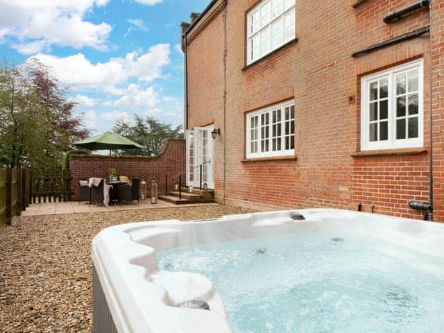 Enclosed patio area with hot tub | Ground Wing - Gresham Hall Estate, Gresham, near Sheringham