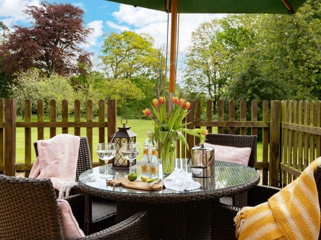 Outdoor furniture within patio area | Ground Wing - Gresham Hall Estate, Gresham, near Sheringham