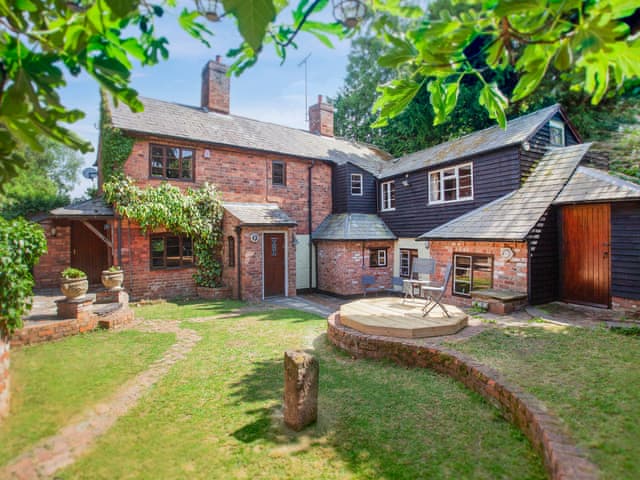 The rear garden is completely enclosed and perfect for dogs | The Cottage, Stockton