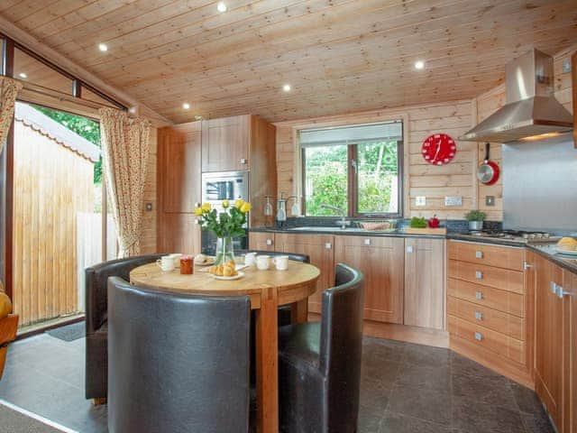 Kitchen/diner | Log Cabin - East Hill Pride Farm, Harpford, near Sidmouth