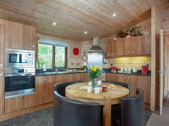 Kitchen/diner | Log Cabin - East Hill Pride Farm, Harpford, near Sidmouth