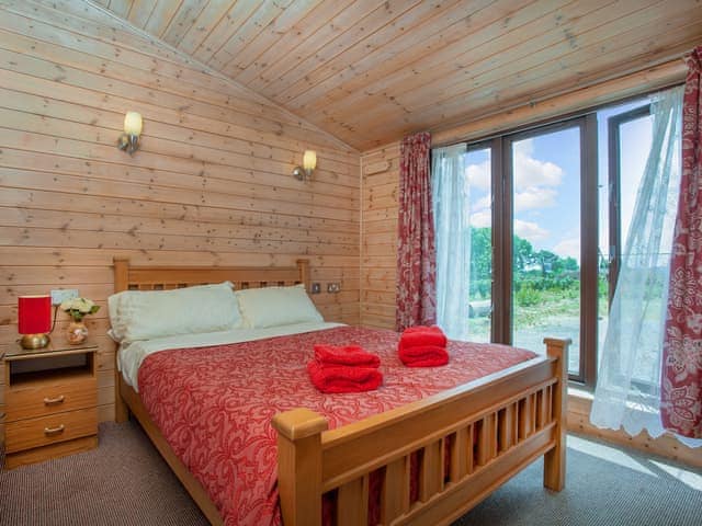 Double bedroom | Log Cabin - East Hill Pride Farm, Harpford, near Sidmouth