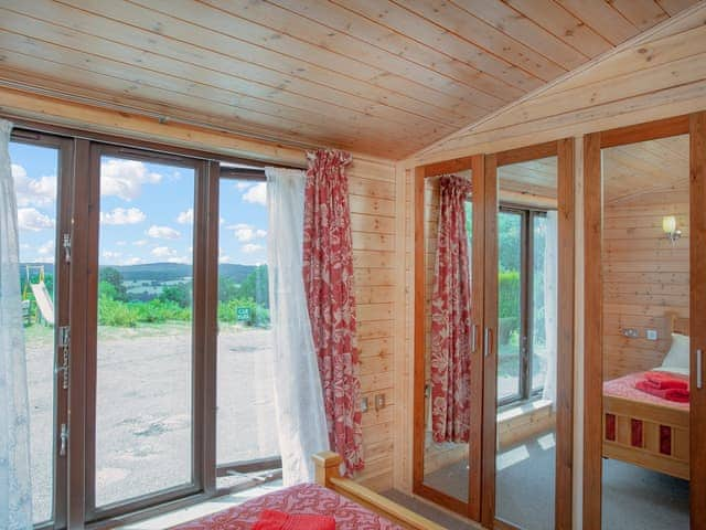 Double bedroom | Log Cabin - East Hill Pride Farm, Harpford, near Sidmouth