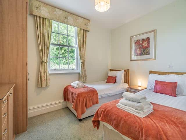 Comfortable twin bedroom with en-suite with shower cubicle | Apartment 14, Silverdale, near Arnside