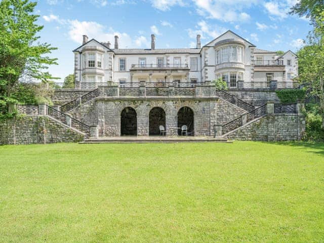 Relaxing patio with garden furniture | Apartment 14, Silverdale, near Arnside