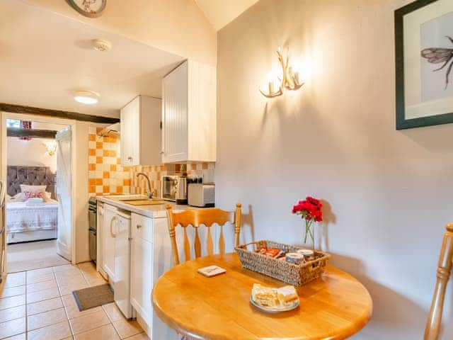 Well-equipped kitchen adjoins the living room | Foxglove Cottage - Laskill Grange, Bilsdale, near Helmsley