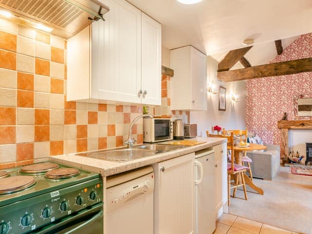 Well-equipped kitchen adjoins the living room | Foxglove Cottage - Laskill Grange, Bilsdale, near Helmsley